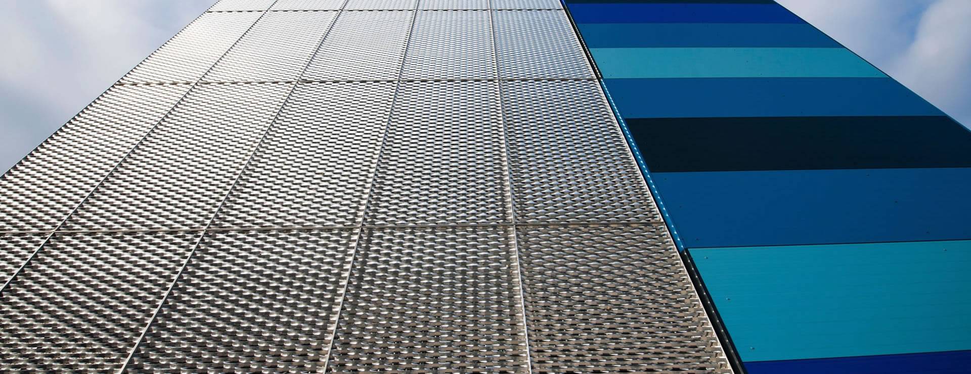 Raised expanded metal meshes with diamond holes are installed on the facades.
