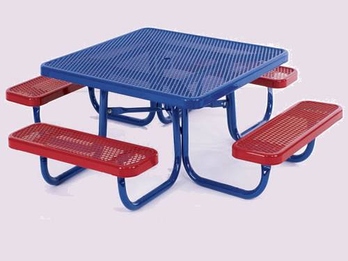 There is one set of garden furniture with four red benches and one blue table.