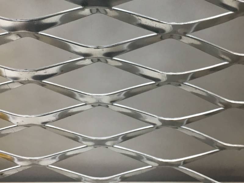 Aluminum expanded metal sheet details with diamond holes and raised surface is placed straightly.