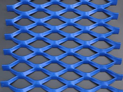 A piece of blue raised expanded metal mesh with power coated surface treatment and diamond holes.