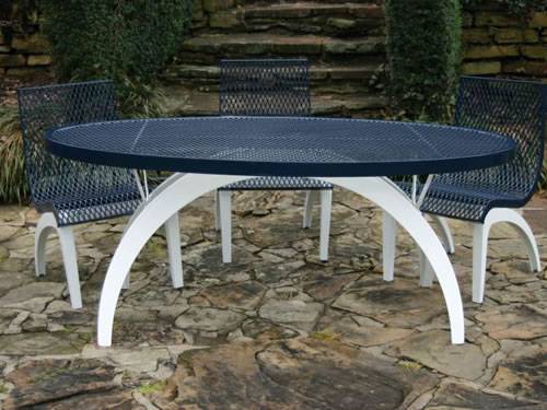 A set of outdoor furniture with black surface and white legs includes one table and three chairs.