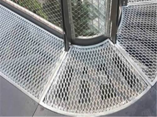 Expanded metal gratings with silver surface and diamond holes are installed on the passage way.