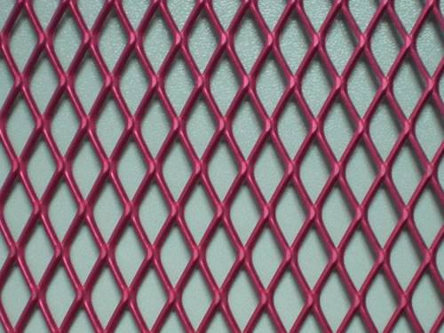 Red expanded metal mesh details with raised surface and diamond holes.